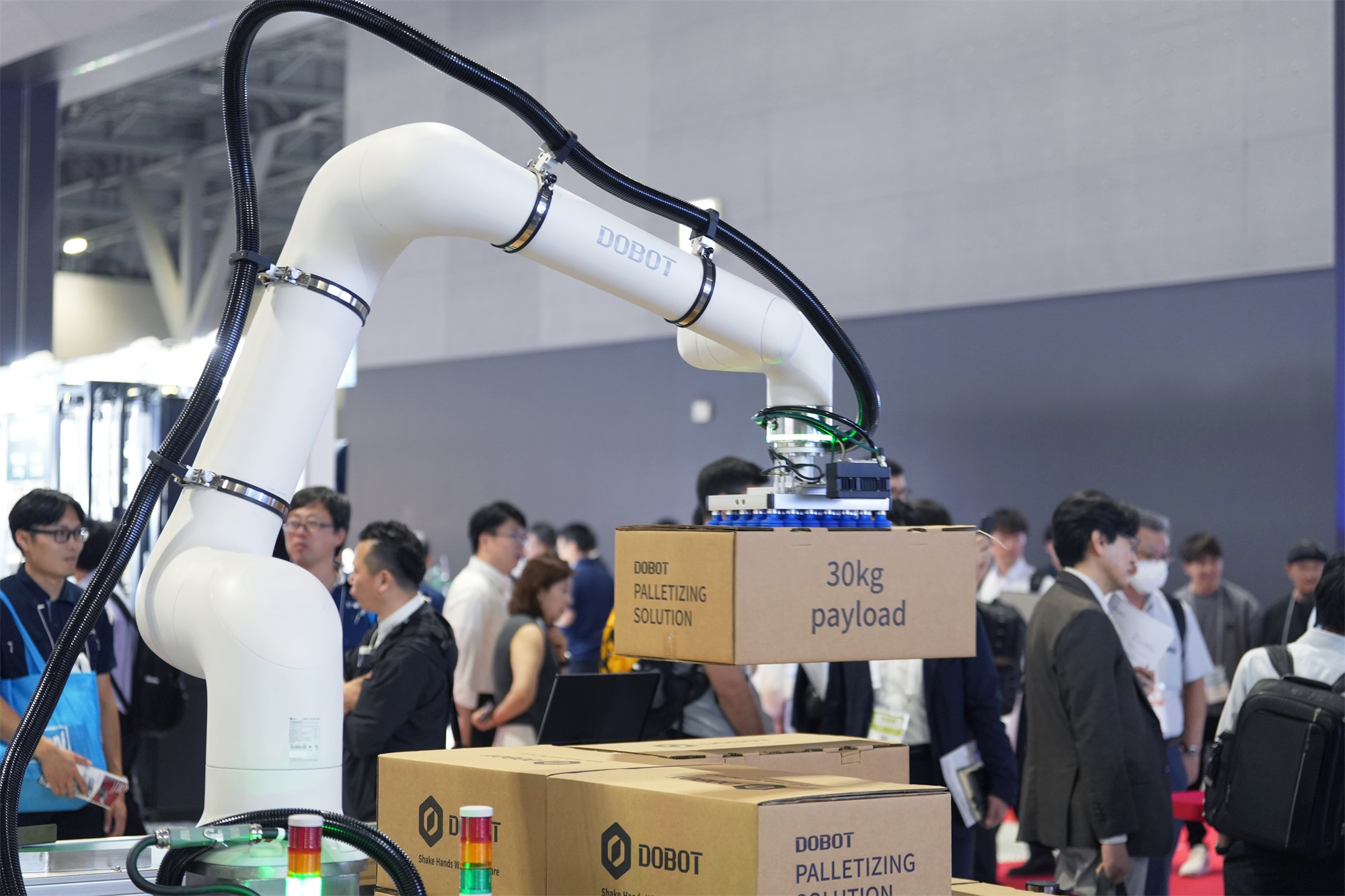 DOBOT CR30H collaborative robot demonstrating high-speed palletizing at RTJ 2026