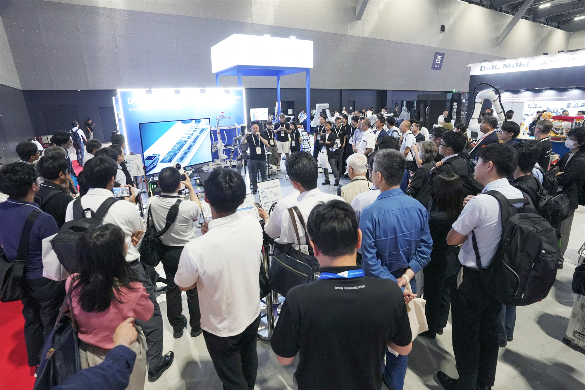 DOBOT booth at Robot Technology Japan 2026 with crowds of visitors